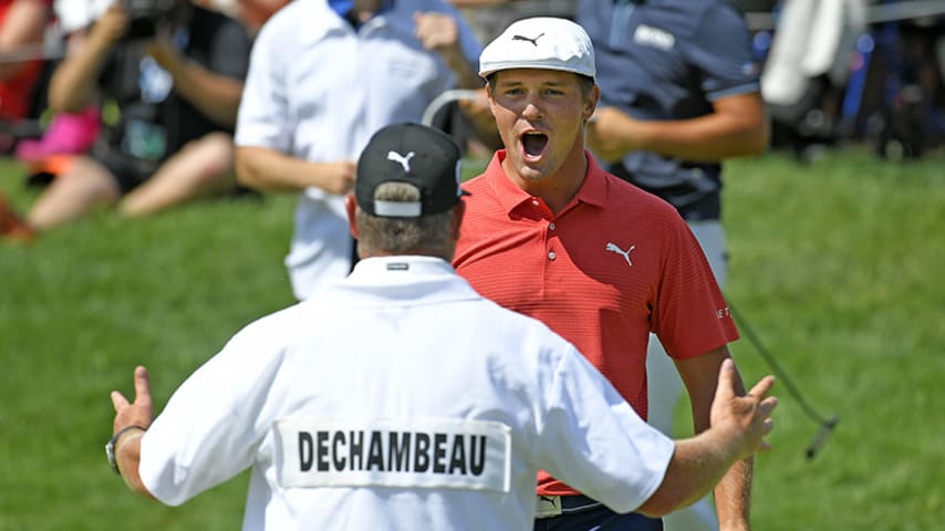 DUBLIN, OHIO - JUNE 03: Bryson DeChambeau celebrates with his caddie after winning in a playoff against Byeong-Hun An of South Korea after the final round of the Memorial Tournament presented by Nationwide at Muirfield Village Golf Club on June 3, 2018 in Dublin, Ohio. (Photo by Stan Badz/PGA TOUR)