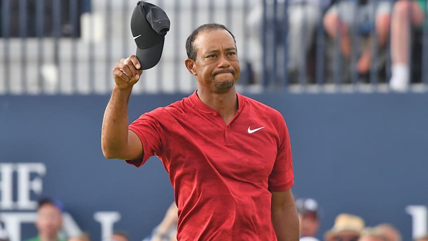 CARNOUSTIE, SCOTLAND - JULY 22:  Tiger Woods of the United States acknowledges the crowd on the 18th green during the final round of the 147th Open Championship at Carnoustie Golf Club on July 22, 2018 in Carnoustie, Scotland.  (Photo by Harry How/Getty Images)