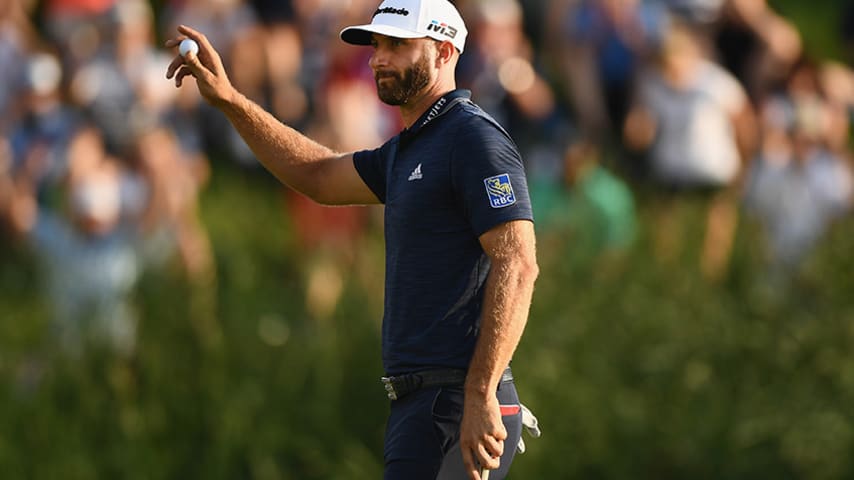 OAKVILLE, ON - JULY 29:  Dustin Johnson celebrates his winning putt on the 18th hole during the final round at the RBC Canadian Open at Glen Abbey Golf Club on July 29, 2018 in Oakville, Canada.  (Photo by Minas Panagiotakis/Getty Images)