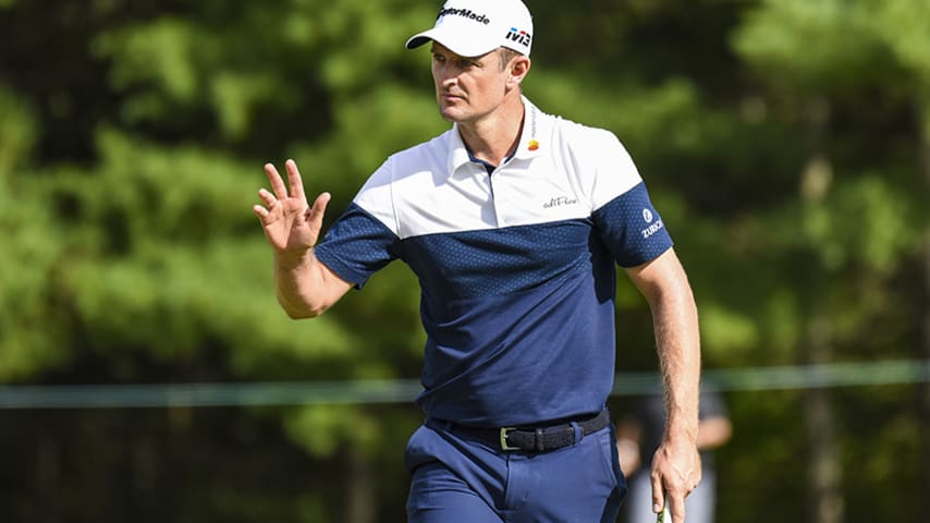 NORTON, MA - AUGUST 31: Justin Rose of England waves to fans after making a birdie putt on the ninth hole green during the first round of the Dell Technologies Championship at TPC Boston on August 31, 2018 in Norton, Massachusetts. (Photo by Keyur Khamar/PGA TOUR)