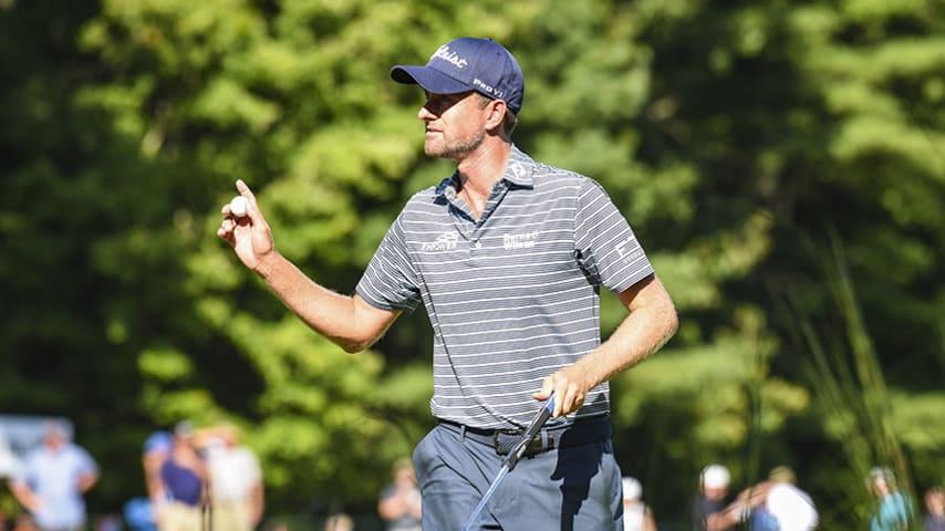 NORTON, MA - SEPTEMBER 01:  Webb Simpson waves his ball to fans after making a birdie putt on the ninth hole green during the second round of the Dell Technologies Championship at TPC Boston on September 1, 2018 in Norton, Massachusetts. (Photo by Keyur Khamar/PGA TOUR)