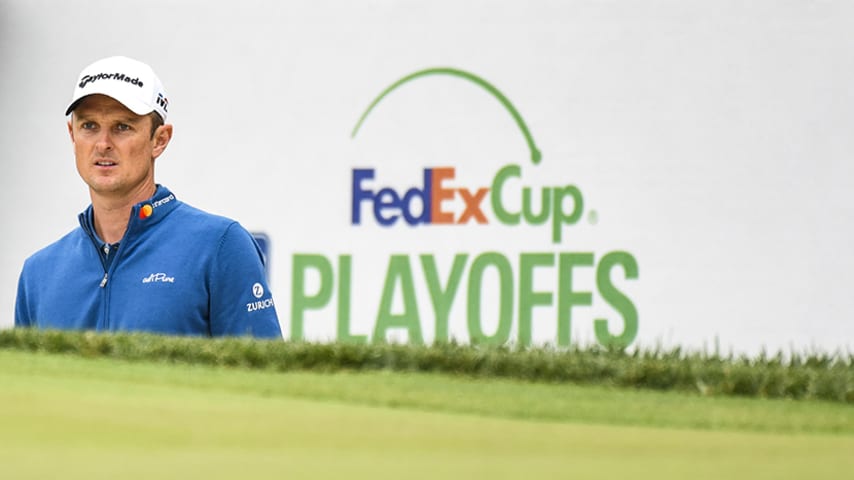 NEWTOWN SQUARE, PA - SEPTEMBER 08:  Justin Rose of England stands in a bunker near a FedExCup Playoffs sign on the 14th hole during the third round of the BMW Championship at Aronimink Golf Club on September 8, 2018 in Newtown Square, Pennsylvania. (Photo by Keyur Khamar/PGA TOUR)