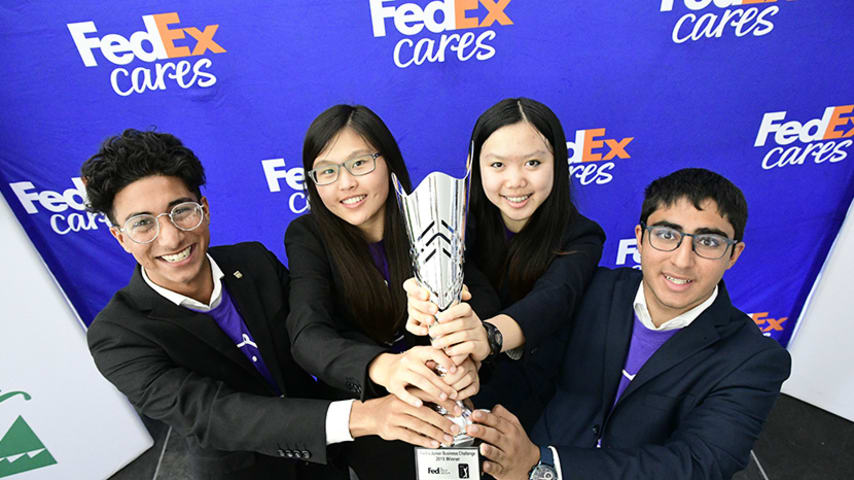 MyCryptoHippo, from JA of Central Ontario, celebrates winning the FedEx Junior Business Challenge finals at the TOUR Championship, where they presented their original business concept and were chosen by the panel judges, including Warrick Dunn (3x Pro Bowler and Atlanta Falcons Ring of Honor member), Marc Leishman (3x PGA TOUR tournament winner), David Cunningham (President and CEO of FedEx Express) and Ryan Lane (Owner of Dream Beard and FedEx Small Business Grant Recipient), to receive a $75,000 donation from FedEx to their local JA chapter held on Wednesday, Sept. 19, 2018 in Atlanta. (John Amis/AP Images for FedEx)
