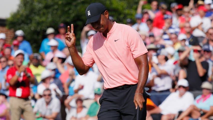 Woods returns to TOUR Championship with share of lead