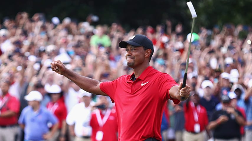 ATLANTA, GA - SEPTEMBER 23:  Tiger Woods of the United States celebrates making a par on the 18th green to win the TOUR Championship at East Lake Golf Club on September 23, 2018 in Atlanta, Georgia.  (Photo by Tim Bradbury/Getty Images)