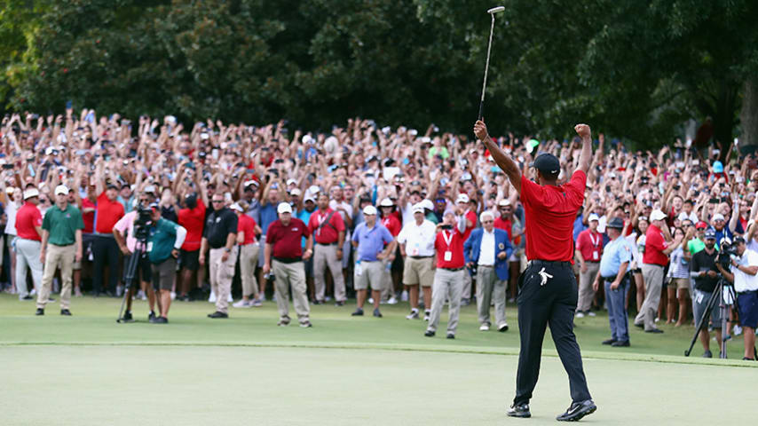 ATLANTA, GA - SEPTEMBER 23:  Tiger Woods of the United States celebrates making a par on the 18th green to win the TOUR Championship at East Lake Golf Club on September 23, 2018 in Atlanta, Georgia.  (Photo by Tim Bradbury/Getty Images)