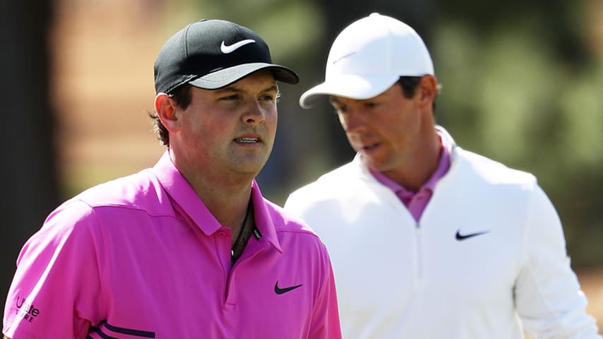 AUGUSTA, GA - APRIL 08: Patrick Reed of the United States and Rory McIlroy of Northern Ireland walk on the seventh green during the final round of the 2018 Masters Tournament at Augusta National Golf Club on April 8, 2018 in Augusta, Georgia. (Photo by Patrick Smith/Getty Images)