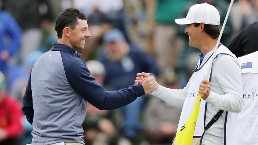 PONTE VEDRA BEACH, FLORIDA - MARCH 17: Rory McIlroy of Northern Ireland and caddie Harry Diamond celebrate after finishing on the 18th green during the final round of The PLAYERS Championship on The Stadium Course at TPC Sawgrass on March 17, 2019 in Ponte Vedra Beach, Florida. (Photo by Richard Heathcote/Getty Images)