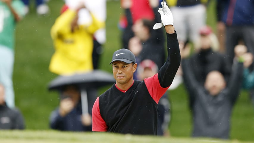 PONTE VEDRA BEACH, FLORIDA - MARCH 17: Tiger Woods of the United States reacts after chipping in for par on the third hole during the final round of The PLAYERS Championship on The Stadium Course at TPC Sawgrass on March 17, 2019 in Ponte Vedra Beach, Florida. (Photo by Michael Reaves/Getty Images)