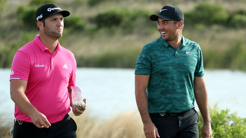 NASSAU, BAHAMAS - NOVEMBER 30: Jon Rahm of Spain (L) and Jason Day of Australia (R) walk off the 18th tee during round two of the Hero World Challenge at Albany, Bahamas on November 30, 2018 at Albany, Bahamas in Nassau, Bahamas. (Photo by Rob Carr/Getty Images)