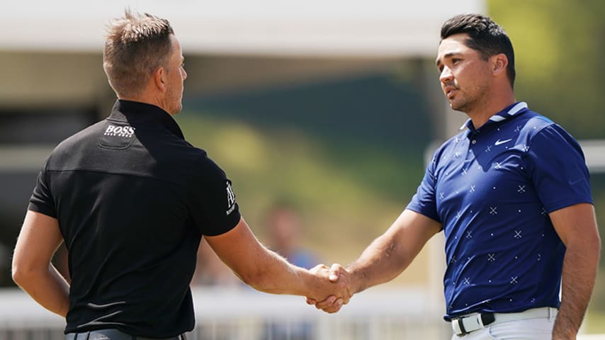 AUSTIN, TEXAS - MARCH 28: Henrik Stenson (L) of Sweden shakes hands with Jason Day of Australia On the 15th green after defeating him 4&3 during the second round of the World Golf Championships-Dell Technologies Match Play at Austin Country Club on March 28, 2019 in Austin, Texas. (Photo by Darren Carroll/Getty Images)
