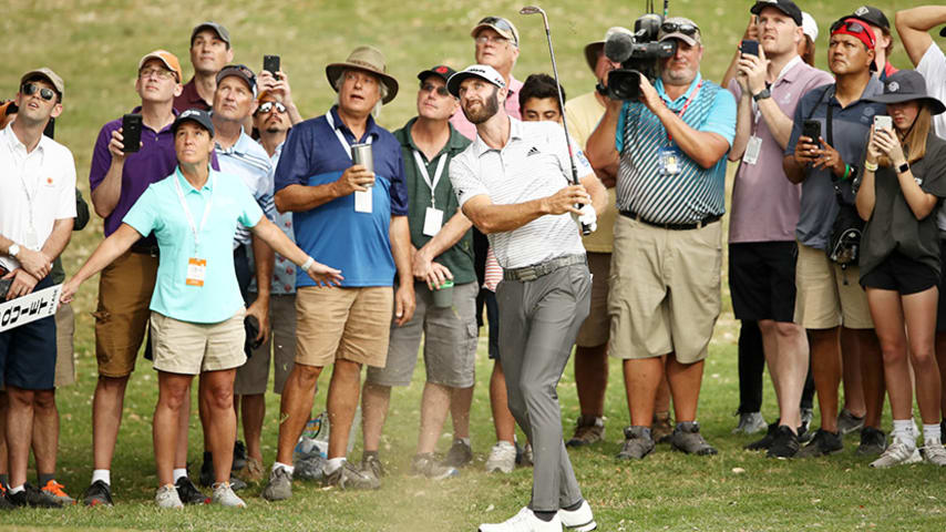 AUSTIN, TEXAS - MARCH 28: Dustin Johnson of the United States plays his second shot on the 18th hole in his match against Branden Grace of South Africa during the second round of the World Golf Championships-Dell Technologies Match Play at Austin Country Club on March 28, 2019 in Austin, Texas. (Photo by Ezra Shaw/Getty Images)