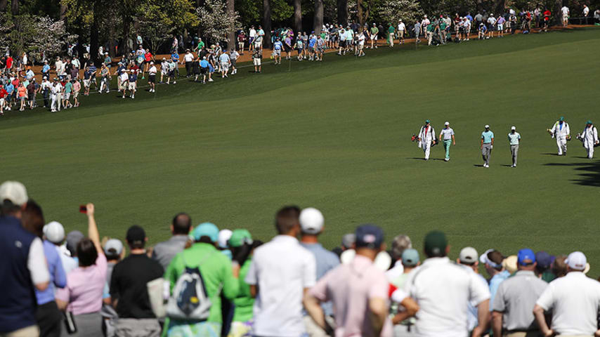 AUGUSTA, GEORGIA - APRIL 10: Justin Thomas, Tiger Woods and Kevin Kisner of the United States walk with caddies during a practice round prior to the Masters at Augusta National Golf Club on April 10, 2019 in Augusta, Georgia. (Photo by Kevin C. Cox/Getty Images)