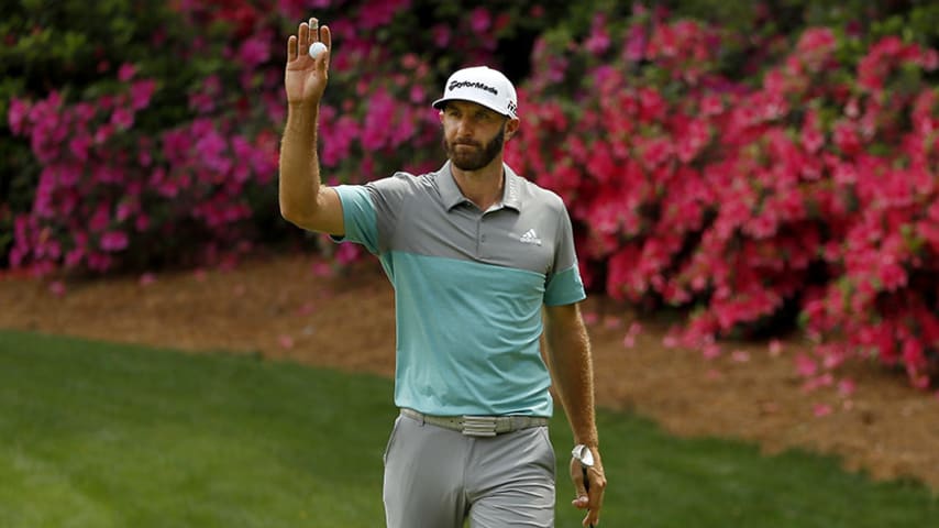 AUGUSTA, GEORGIA - APRIL 12: Dustin Johnson of the United States acknowledges patrons on the 13th green during the second round of the Masters at Augusta National Golf Club on April 12, 2019 in Augusta, Georgia. (Photo by Kevin C. Cox/Getty Images)