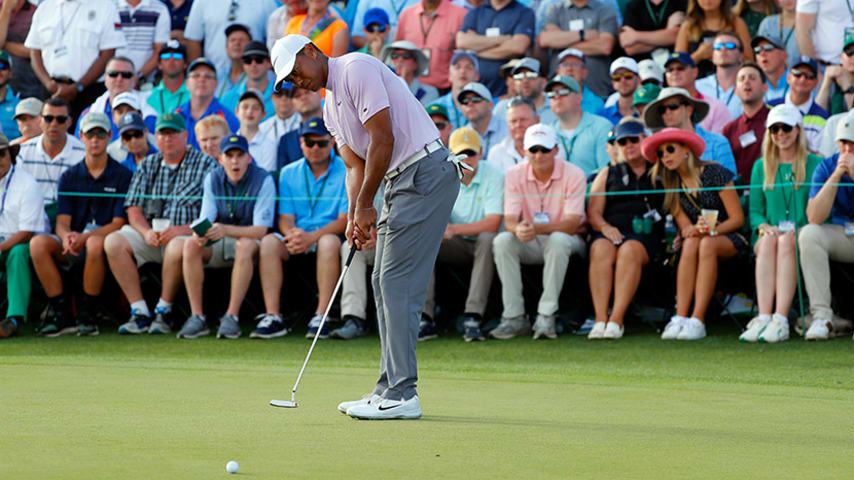 AUGUSTA, GEORGIA - APRIL 13: Tiger Woods of the United States putts on the 18th green during the third round of the Masters at Augusta National Golf Club on April 13, 2019 in Augusta, Georgia. (Photo by Kevin C. Cox/Getty Images)