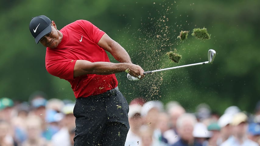 AUGUSTA, GEORGIA - APRIL 14: Tiger Woods of the United States plays a shot from the 12th tee during the final round of the Masters at Augusta National Golf Club on April 14, 2019 in Augusta, Georgia. (Photo by David Cannon/Getty Images)