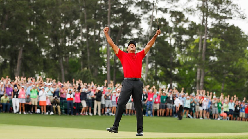 AUGUSTA, GEORGIA - APRIL 14: (Sequence frame 7 of 12) Tiger Woods of the United States celebrates after making his putt on the 18th green to win the Masters at Augusta National Golf Club on April 14, 2019 in Augusta, Georgia. (Photo by Kevin C. Cox/Getty Images)