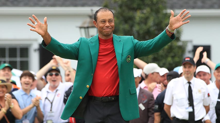 AUGUSTA, GEORGIA - APRIL 14: Tiger Woods of the United States smiles after being awarded the Green Jacket during the Green Jacket Ceremony after winning the Masters at Augusta National Golf Club on April 14, 2019 in Augusta, Georgia. (Photo by Andrew Redington/Getty Images)