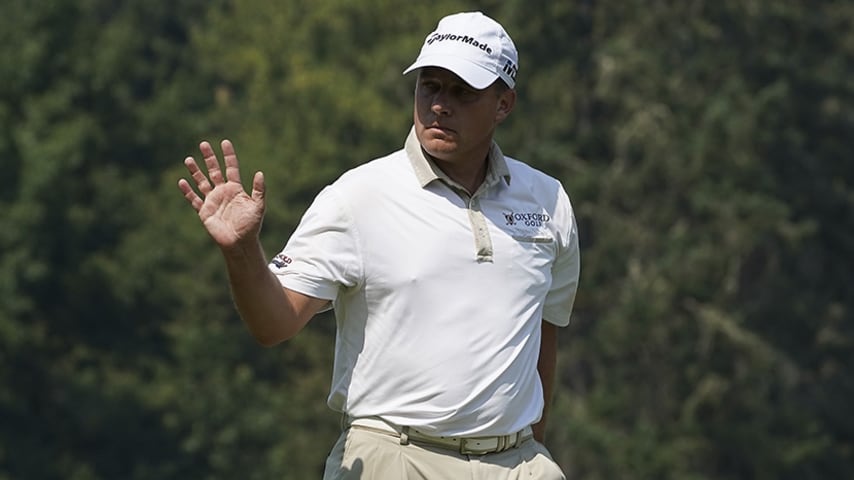 PORTLAND, OR - AUGUST 19:  Roland Thatcher reacts to the gallery after sinking his birdie putt on the third hole during the final round of the WinCo Foods Portland Open on August 19, 2018 in Portland, Oregon.  (Photo by Steve Dykes/Getty Images)