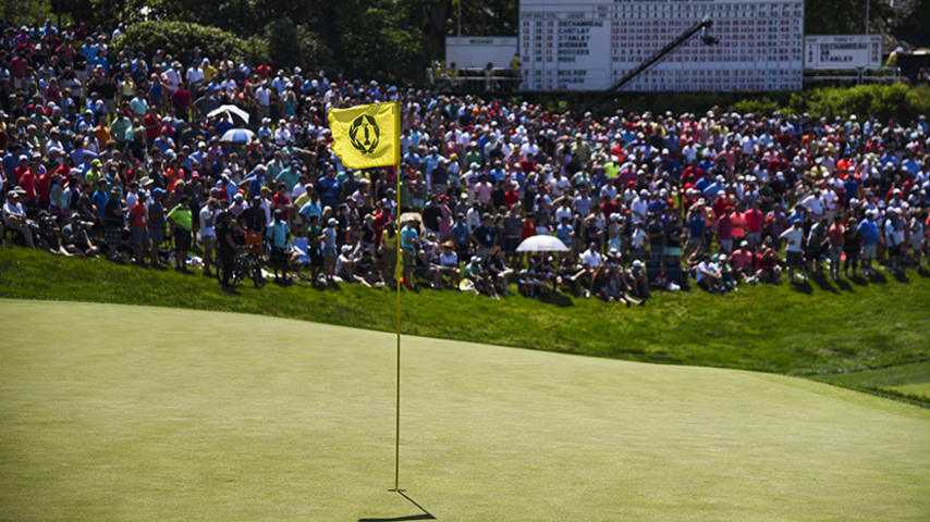 DUBLIN, OH - JUNE 03:  A tournament pin flag flies on the 18th hole green as fans wait for a playoff to begin during the final round of the Memorial Tournament presented by Nationwide at Muirfield Village Golf Club on June 3, 2018 in Dublin, Ohio. (Photo by Keyur Khamar/PGA TOUR)