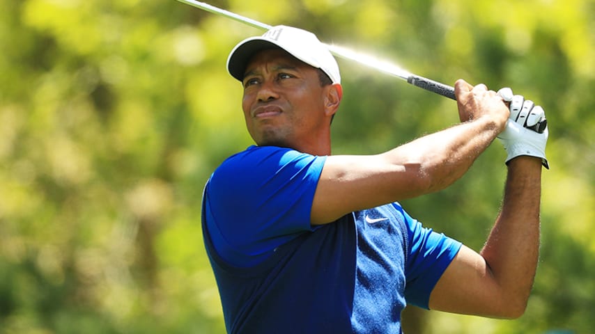 FARMINGDALE, NEW YORK - MAY 16: Tiger Woods of the United States plays his shot from the eighth tee during the first round of the 2019 PGA Championship at the Bethpage Black course on May 16, 2019 in Farmingdale, New York. (Photo by Mike Ehrmann/Getty Images)