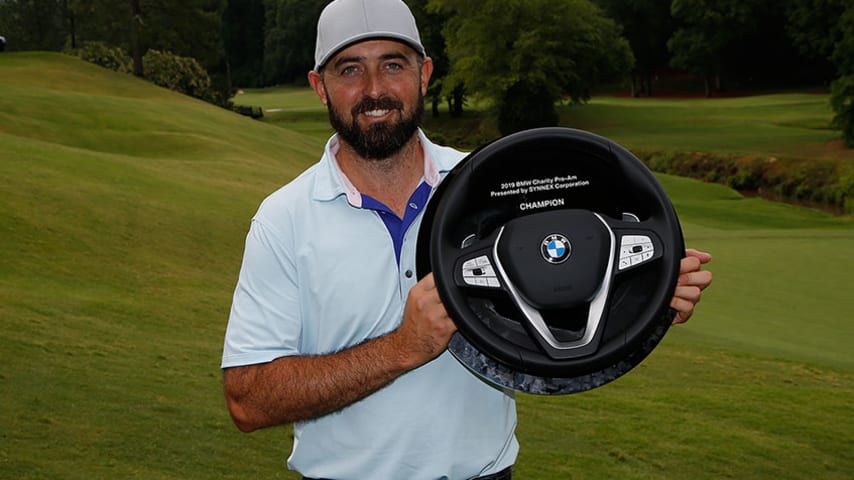 GREER, SC - JUNE 09:  Rhein Gibson of Australia holds the trophy after winning the BMW Charity Pro-Am presented by SYNNEX Corporation held at Thornblade Club on June 9, 2019 in Greer, South Carolina.  (Photo by Michael Cohen/Getty Images)