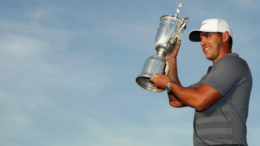 SOUTHAMPTON, NY - JUNE 17:  Brooks Koepka of the United States celebrates with the U.S. Open Championship trophy after winning the 2018 U.S. Open at Shinnecock Hills Golf Club on June 17, 2018 in Southampton, New York.  (Photo by Streeter Lecka/Getty Images)