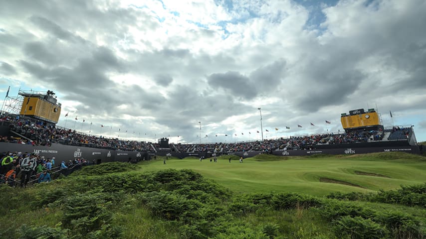 PORTRUSH, NORTHERN IRELAND - JULY 18: A general view of the 18th green as the group of Brooks Koepka of the United States, Shubhankar Sharma of India and Louis Oosthuizen of South Africa finish up on the 18th hole during the first round of the 148th Open Championship held on the Dunluce Links at Royal Portrush Golf Club on July 18, 2019 in Portrush, United Kingdom. (Photo by David Cannon/Getty Images)