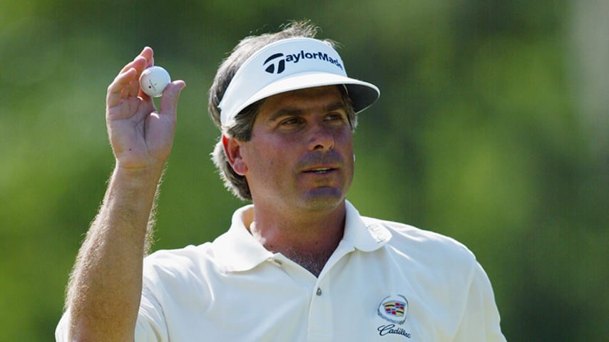 HUMBLE, TX - APRIL 27:  Fred Couples acknowledges the gallery after making a birdie putt on the 15th hole during the final round of the Shell Houston Open on April 27, 2003 at the Redstone Golf Club in Humble, Texas. (Photo by Jeff Gross/Getty Images)