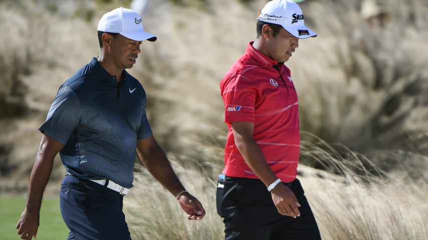 NASSAU, BAHAMAS - DECEMBER 02: Tiger Woods and  Hideki Matsuyama of Japan talk while walking up the sixth hole during the third round of the Hero World Challenge at Albany course on December 2, 2017 in Nassau, Bahamas. (Photo by Ryan Young/PGA TOUR)