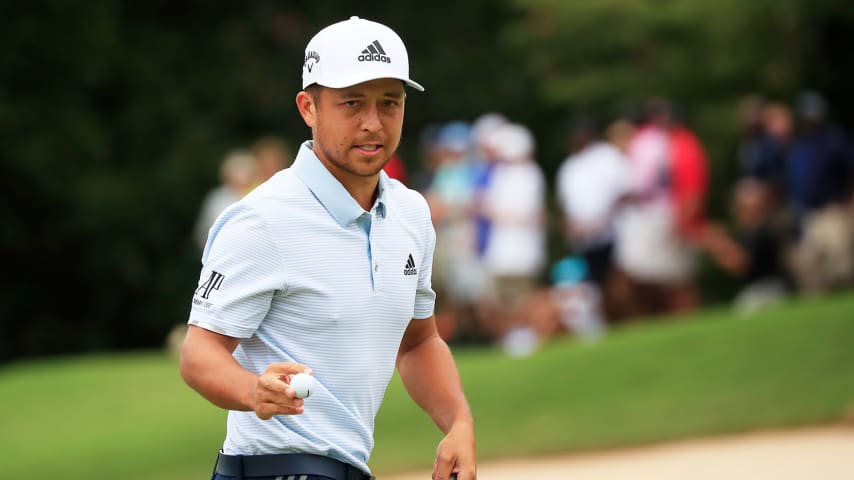 ATLANTA, GEORGIA - AUGUST 25: Xander Schauffele of the United States reacts to his par on the first green during the final round of the TOUR Championship at East Lake Golf Club on August 25, 2019 in Atlanta, Georgia. (Photo by Cliff Hawkins/Getty Images)