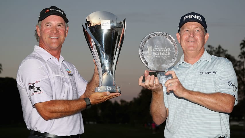 PHOENIX, ARIZONA - NOVEMBER 10: Winner of the Charles Schwab Cup, Scott McCarron (L) and winner of the Charles Schwab Cup Championship, Jeff Maggert (R) pose together with their trophies following the final round at Phoenix Country Club on November 10, 2019 in Phoenix, Arizona. (Photo by Christian Petersen/Getty Images)