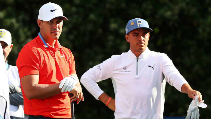 PONTE VEDRA BEACH, FLORIDA - MARCH 15:  Brooks Koepka of the United States and Rickie Fowler of the United States look on during the second round of The PLAYERS Championship on The Stadium Course at TPC Sawgrass on March 15, 2019 in Ponte Vedra Beach, Florida. (Photo by Gregory Shamus/Getty Images)