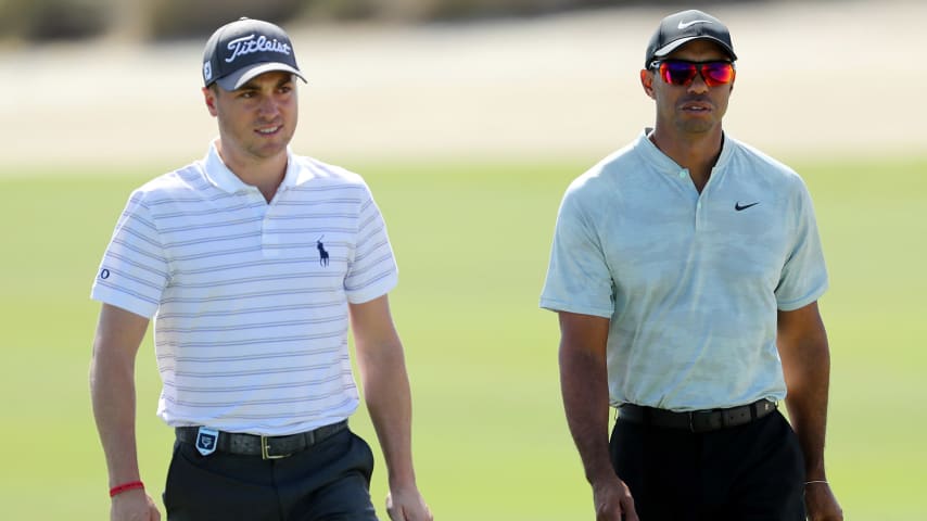 NASSAU, BAHAMAS - NOVEMBER 29: Tiger Woods of the United States walks with Justin Thomas of the United States on the third hole during the first round of the 2018 Hero World Challenge at the Albany Bahamas on November 29, 2018 in Nassau, Bahamas. (Photo by David Cannon/Getty Images)