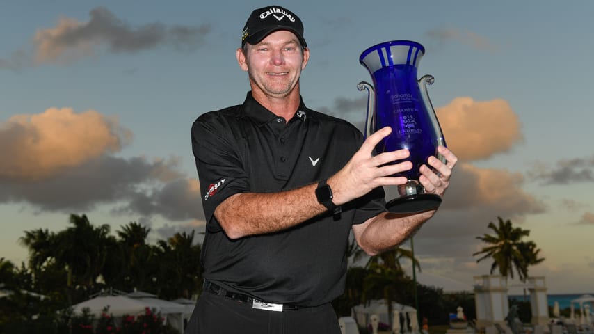 GREAT EXUMA, BAHAMAS - JANUARY 15: Tommy Gainey holds the trophy after during the final round of the Korn Ferry Tour's The Bahamas Great Exuma Classic at Sandals Emerald Bay golf course on January 15, 2020 in Great Exuma, Bahamas. (Photo by Ben Jared/PGA TOUR via Getty Images)