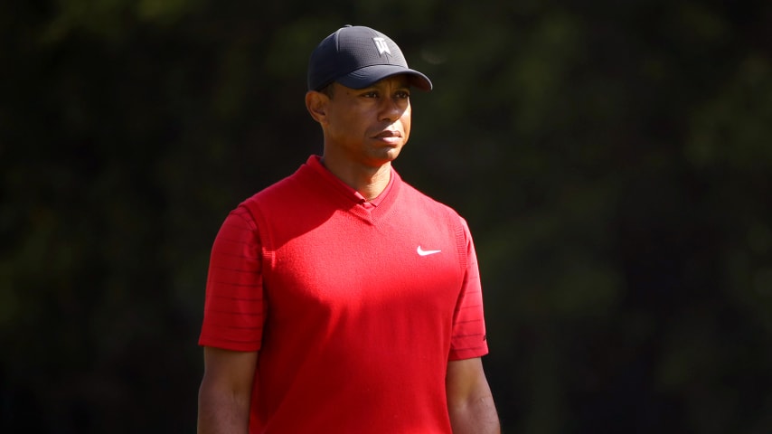PACIFIC PALISADES, CALIFORNIA - FEBRUARY 16: Tiger Woods of the United States stands on the 12th green during the final round of the Genesis Invitational on February 16, 2020 in Pacific Palisades, California. (Photo by Katelyn Mulcahy/Getty Images)