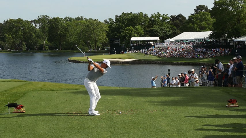 CHARLOTTE, NC - MAY 03:  (Swing sequence 5 of 12) Rickie Fowler plays his tee shot on the 17th hole during the first round of the 2018 Wells Fargo Championship at Quail Hollow Club on May 3, 2018 in Charlotte, North Carolina.  (Photo by Streeter Lecka/Getty Images)