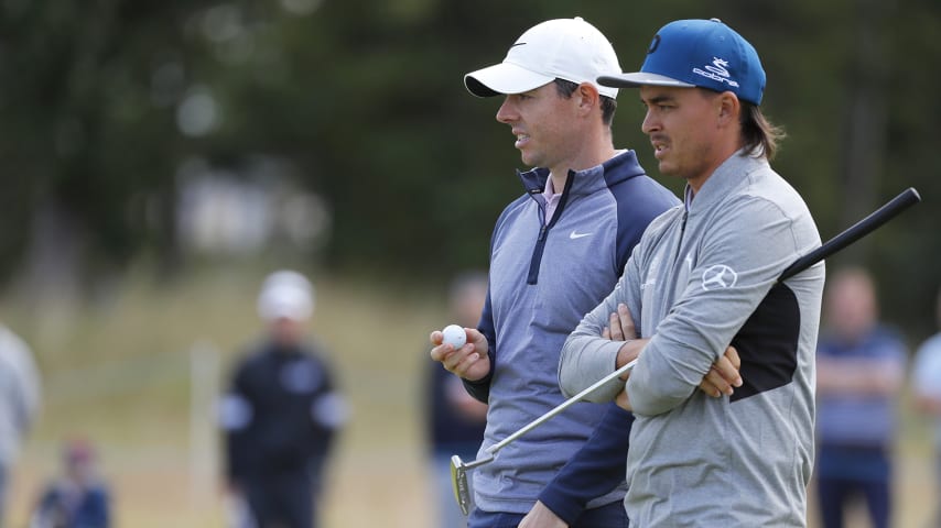 NORTH BERWICK, SCOTLAND - JULY 12: Rickie Fowler of the USA and Rory Mcilroy of Northern Ireland talk during Day 2 of the Aberdeen Standard Investments Scottish Open at The Renaissance Club on July 12, 2019 in North Berwick, United Kingdom. (Photo by Kevin C. Cox/Getty Images)