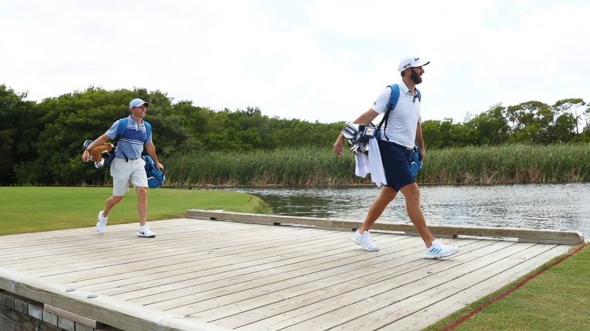 JUNO BEACH, FLORIDA - MAY 17: Rory McIlroy of the American Nurses Foundation team and Dustin Johnson of the American Nurses Foundation team walk on the second hole during the TaylorMade Driving Relieve Supported By UnitedHealth Group on May 17, 2020 at Seminole Golf Club in Juno Beach, Florida. (Photo by Mike Ehrmann/Getty Images)