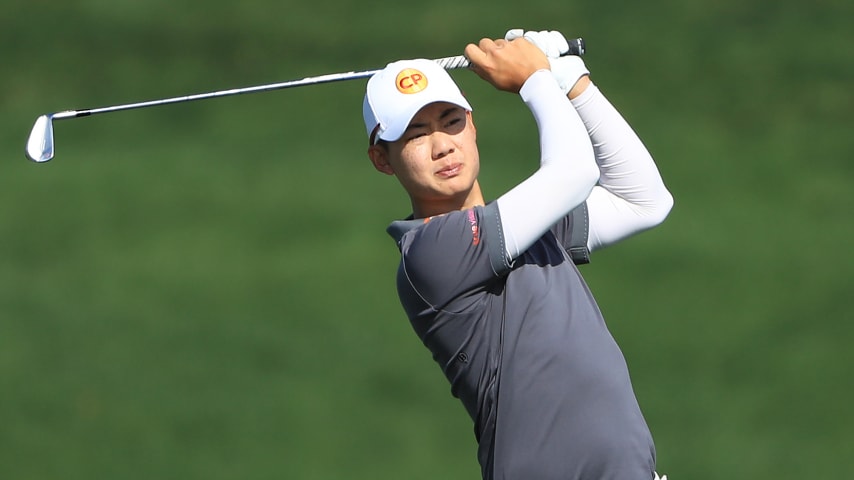 PONTE VEDRA BEACH, FLORIDA - MARCH 11: Jazz Janewattananond of Thailand plays an approach during a practice round prior to The PLAYERS Championship on The Stadium Course at TPC Sawgrass  on March 11, 2020 in Ponte Vedra Beach, Florida. (Photo by Sam Greenwood/Getty Images)