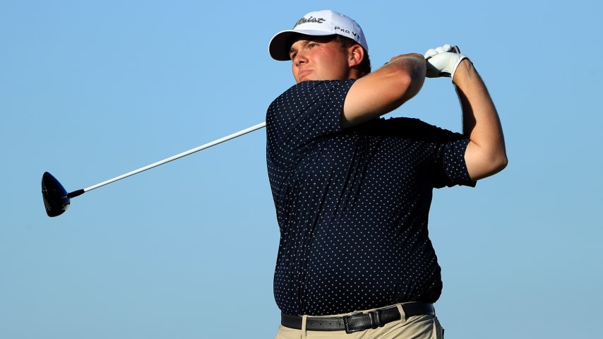 WINTER GARDEN, FLORIDA - DECEMBER 15: Braden Thornberry plays a shot on the 18th hole during the Korn Ferry Tour Q-School Tournament Finals at Orange County National Golf Club Crooked Cat course on December 15, 2019 in Winter Garden, Florida. (Photo by Sam Greenwood/Getty Images)