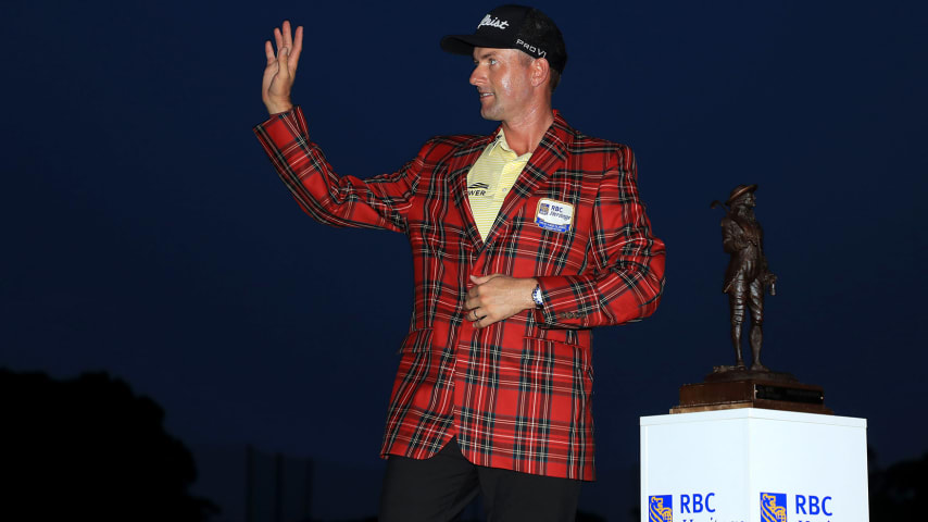 HILTON HEAD ISLAND, SOUTH CAROLINA - JUNE 21: Webb Simpson of the United States celebrates with the trophy and the plaid jacket after winning during the final round of the RBC Heritage on June 21, 2020 at Harbour Town Golf Links in Hilton Head Island, South Carolina. (Photo by Streeter Lecka/Getty Images)