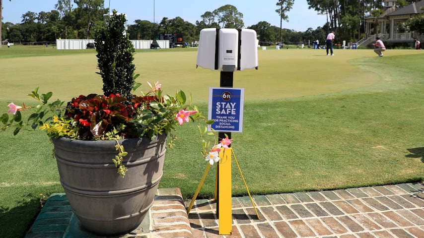 HILTON HEAD ISLAND, SOUTH CAROLINA - JUNE 19: Signage promoting social distancing is displayed with hand sanitizer as a COVID-19 precaution during the second round of the RBC Heritage on June 19, 2020 at Harbour Town Golf Links in Hilton Head Island, South Carolina. (Photo by Streeter Lecka/Getty Images)