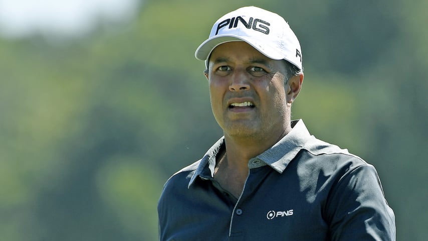 HUMBLE, TX - OCTOBER 10: Arjun Atwal of India makes a birdie at the 18th hole during the first round of the Houston Open at the Golf Club of Houston on October 10, 2019 in Humble, Texas. (Photo by Tracy Wilcox/PGA TOUR via Getty Images)