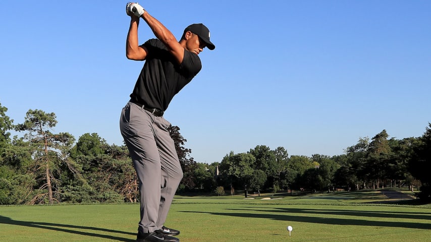 DUBLIN, OHIO - JULY 14: Tiger Woods plays a shot during a practice round prior to The Memorial Tournament at Muirfield Village Golf Club on July 14, 2020 in Dublin, Ohio. (Photo by Sam Greenwood/Getty Images)