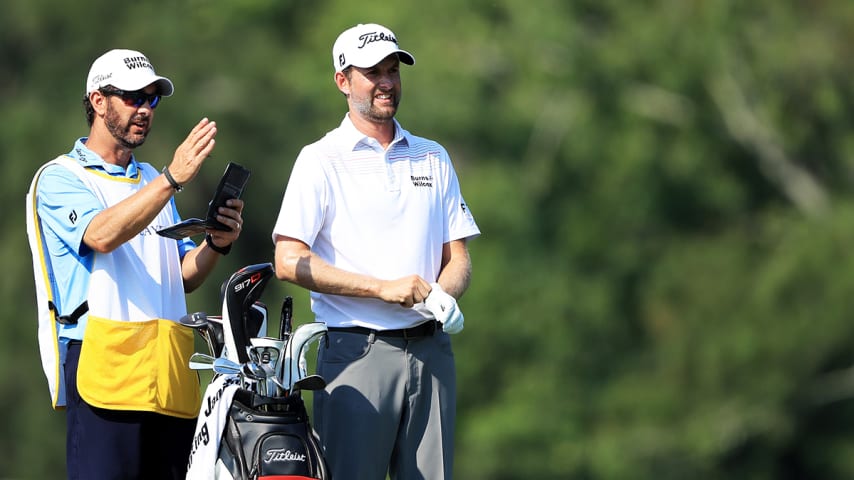 PONTE VEDRA BEACH, FL - MAY 11:  Webb Simpson of the United States talks with his caddie Paul Tesori on the 14th hole during the second round of THE PLAYERS Championship on the Stadium Course at TPC Sawgrass on May 11, 2018 in Ponte Vedra Beach, Florida.  (Photo by Sam Greenwood/Getty Images)