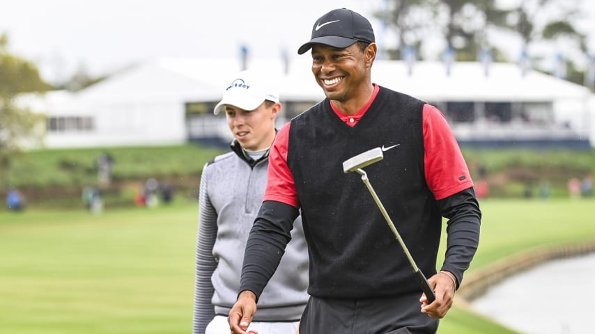 PONTE VEDRA BEACH, FL - MARCH 17:  Tiger Woods smiles after finishing play on the 18th hole green with  Matthew Fitzpatrick of England during the final round of THE PLAYERS Championship on the Stadium Course at TPC Sawgrass on March 17, 2019 in Ponte Vedra Beach, Florida. (Photo by Keyur Khamar/PGA TOUR)