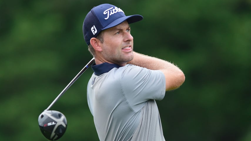 GREENSBORO, NORTH CAROLINA - AUGUST 13: Webb Simpson of the United States plays his shot from the 11th tee during the first round of the Wyndham Championship at  Sedgefield Country Club on August 13, 2020 in Greensboro, North Carolina. (Photo by Jared C. Tilton/Getty Images)