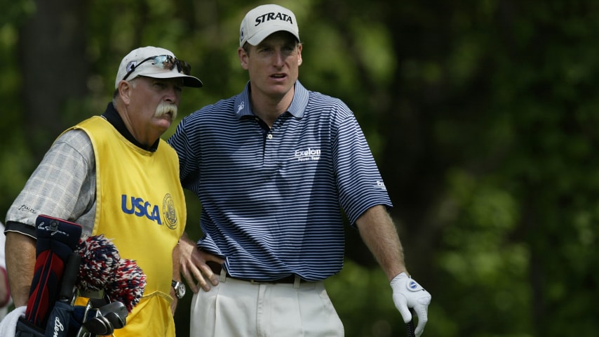 OLYMPIA FIELDS, IL - JUNE 14:  Jim Furyk discusses a shot with his caddie Mike "Fluff" Cowan on the seventh tee during the third round of the 2003 US Open on the North Course at the Olympia Fields Country Club on June 14, 2003 in Olympia Fields, Illinois.  (Photo by Craig Jones/Getty Images)