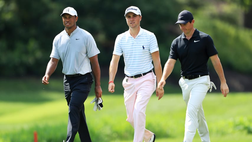 ST LOUIS, MO - AUGUST 10:  (L-R) Tiger Woods of the United States, Justin Thomas of the United States and Rory McIlroy of Northern Ireland walk on the eighth hole during the second round of the 2018 PGA Championship at Bellerive Country Club on August 10, 2018 in St Louis, Missouri.  (Photo by Sam Greenwood/Getty Images)